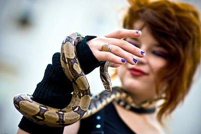 Female Snake Handler, in Main Market Square